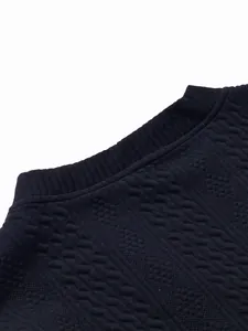 Detailed view of the ribbed collar and textured jacquard knit on men's navy cardigan jacket