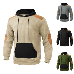 Detail of men's casual waffle knit hoodie showing various color options in studio setting