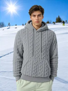 Mens grey jacquard fleece warm hoodie with kangaroo pocket shown in snowy outdoor scene