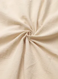 Close-up of breathable solid color linen fabric texture showing natural weave details