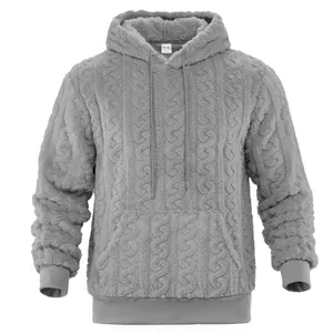 Detail of grey jacquard fleece hoodie showing soft texture and kangaroo pocket
