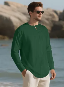 Detail of dark green linen henley shirt with vertical pleated stripes on the chest.