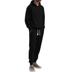 Men's jacquard knitted tracksuit set featuring a black hoodie and matching jogger pants.
