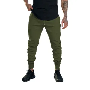 Pantalones jogger slim verde oliva oscuro para hombre con cordón y puños para el deporte