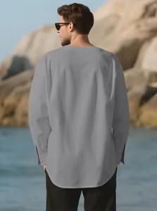 Back view of men's grey long sleeve linen Henley shirt showing back seams and fabric