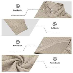 Vue rapprochée du sweat-shirt homme avec tissu jacquard, col zippé et poignets côtelés
