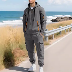 Stylish grey men's hooded tracksuit set with orange zipper accents for outdoor sports