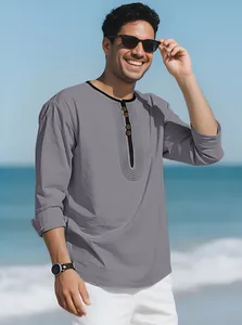 Close-up of men's casual linen T-shirt featuring a decorative button henley neckline