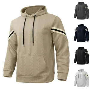 Detail of heavy jacquard men's hoodie with striped sleeves and drawstring hood