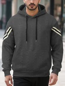 Men's charcoal grey jacquard hoodie detail showing textured fabric and sleeve stripes