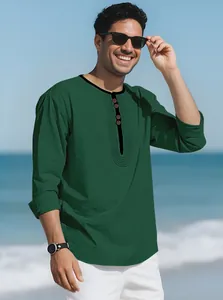 Close-up of a men's breathable green linen long-sleeve T-shirt in a loose fit