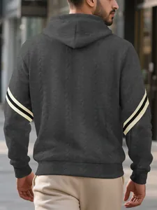 Rear view of men's heavyweight jacquard hoodie with sleeve stripes and textured knit