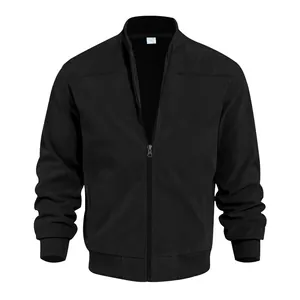 Close-up detail of a men's black suede bomber jacket with full zipper and stand collar