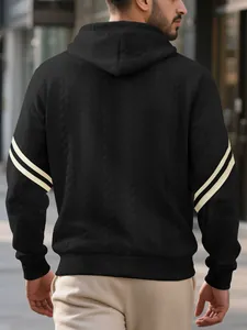 Detailed back view of the black men's hooded sweatshirt featuring a unique jacquard texture