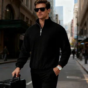 Premium men's black quarter-zip cable knit sweater perfect for sophisticated urban travel