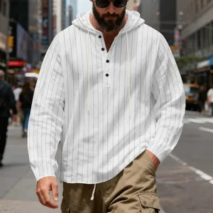 Casual men's white striped linen hoodie with four-button placket in urban street setting.
