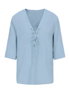 Detailed view of the light blue cotton linen V-neck lace-up shirt with 3/4 sleeves.