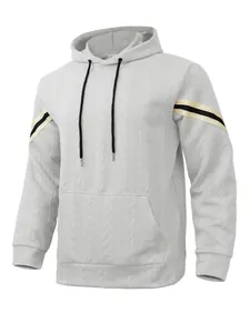 Detailed view of men's heavyweight jacquard hoodie with textured knit and sleeve stripes
