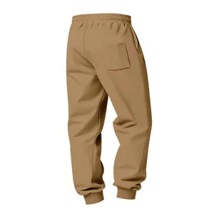 Back view of khaki heavy-duty men's joggers with elastic waist and ribbed cuffs