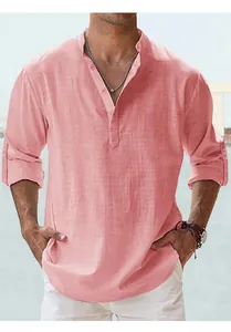 Close-up of pink men's casual Henley shirt with buttoned half-placket and soft cotton texture