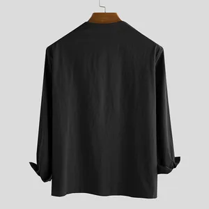 Minimalist men's black long-sleeve cotton shirt, loose casual vintage style.
