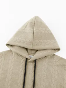 Close-up detail of khaki jacquard textured men's heavyweight hooded sweatshirt