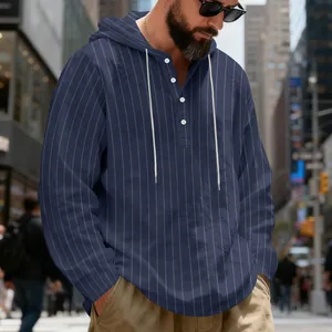 Close-up of a men's navy blue striped linen hoodie featuring buttons and white drawstrings