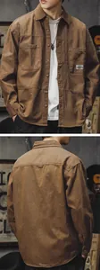 Detailed front and back views of a men's vintage brown cotton long-sleeve cargo shirt