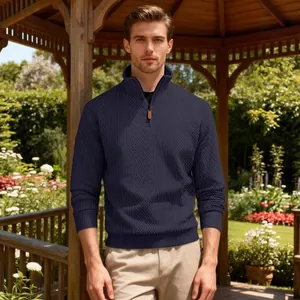 Men's navy blue half-zip sweatshirt with jacquard texture and stand collar in a garden