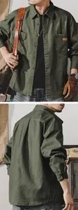 Detailed front and back views of an olive green cotton vintage military workwear shirt