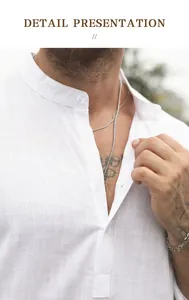 Primo piano del colletto alla coreana bianco e del tessuto di lino della camicia