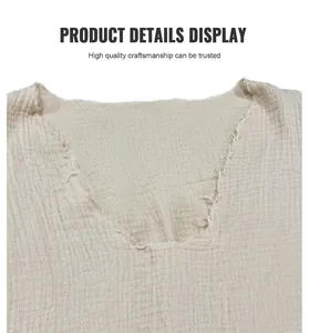 Detail shot of the raw frayed edge V-neckline on a beige crinkled cotton casual shirt