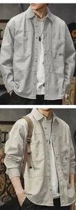 Detailed view of a vintage-style men's cotton long-sleeved work shirt with pocket
