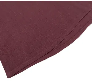 Detailed macro shot of breathable burgundy fabric texture for men's casual V-neck shirt.