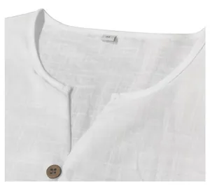 Detail view of white linen-blend shirt showing breathable fabric texture and V-neck
