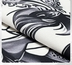 Macro detail of men's short sleeve shirt showing black ink horse print fabric texture