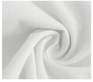Detailed macro view showing the soft breathable texture of white linen cotton shirt fabric
