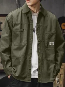 Vintage style men's washed cotton long sleeve workwear shirt in olive green color