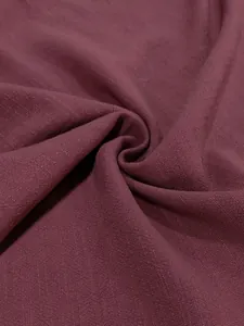 Close-up texture of maroon breathable fabric for men's casual lightweight summer shirt