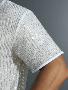 Shiny men's silver sequined short sleeve button down shirt for party and night club events.