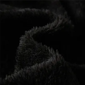 Detailed close-up showing the soft and dense black faux fur lining texture of a biker jacket