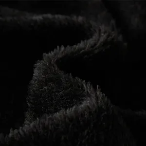 Detailed close-up of soft black faux fur plush lining for men's leather motorcycle jackets