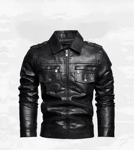 Detail view of a black faux leather motorcycle jacket with front zippers and pockets.