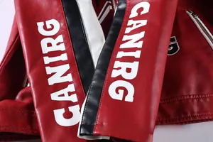 Close-up of color-blocked PU leather motorcycle jacket sleeve with CANIRG print detail