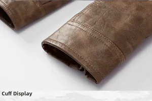 Close-up of double-stitched sleeve cuffs on brown faux leather motorcycle jacket for men