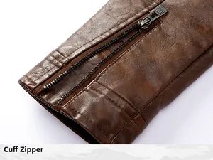 Detailed macro view showing the high-quality zippered cuff on a brown men's moto jacket