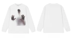 Detailed front and back views of a white long-sleeved T-shirt featuring a ghost graphic