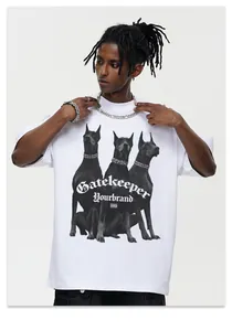 Detail view of white street style T-shirt with Doberman dogs and gothic text graphic print.