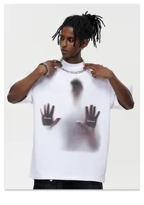 Detailed view of heavy cotton streetwear T-shirt in white with shadow hand print