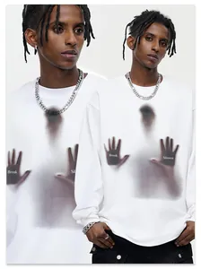 Close-up detail of the Break Silence graphic print on a white streetwear long-sleeve T-shirt.
